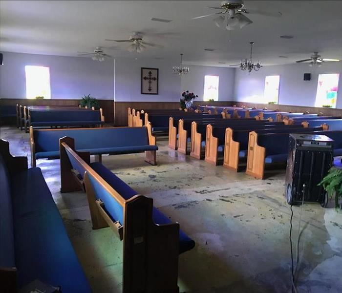 church with storm damage after photo