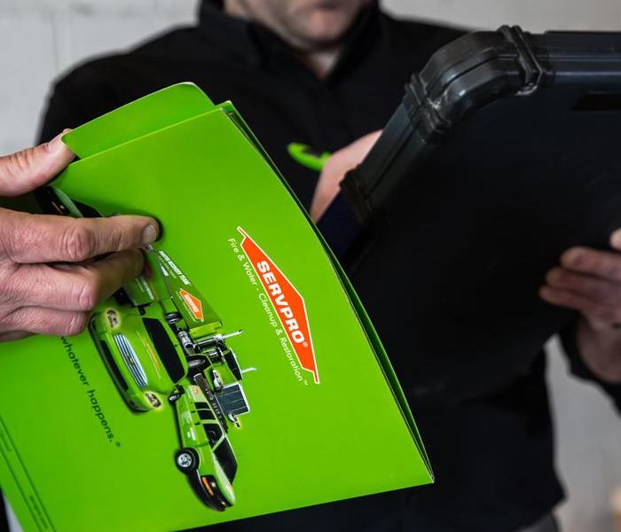 Our SERVPRO team of Belle Meade and West Nashville comes prepared with their signature green folders and advanced tools!