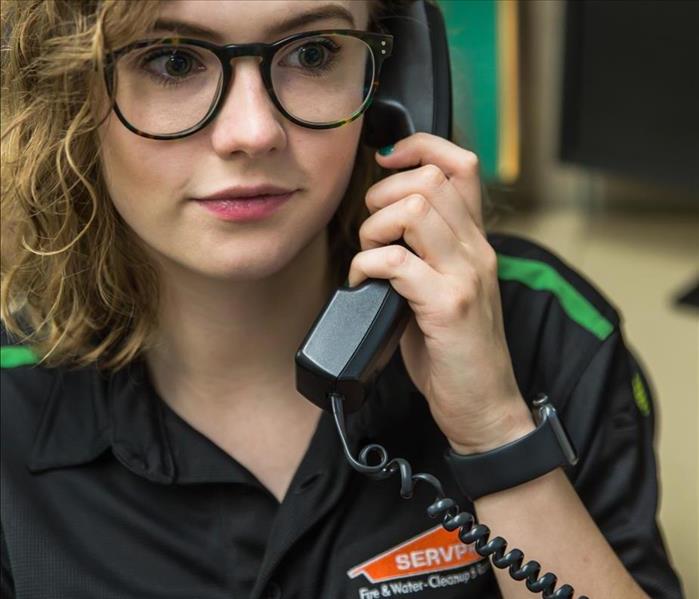 SERVPRO of Belle Meade technician answering phone