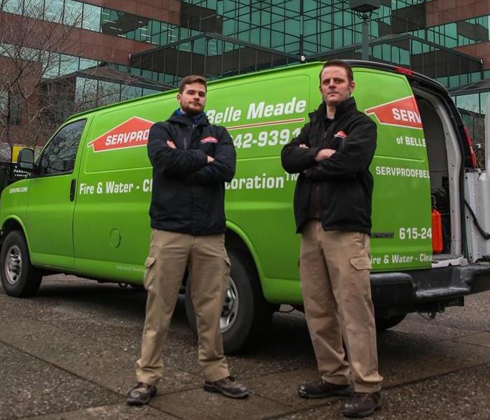 SERVPRO technicians and truck outside of commercial building